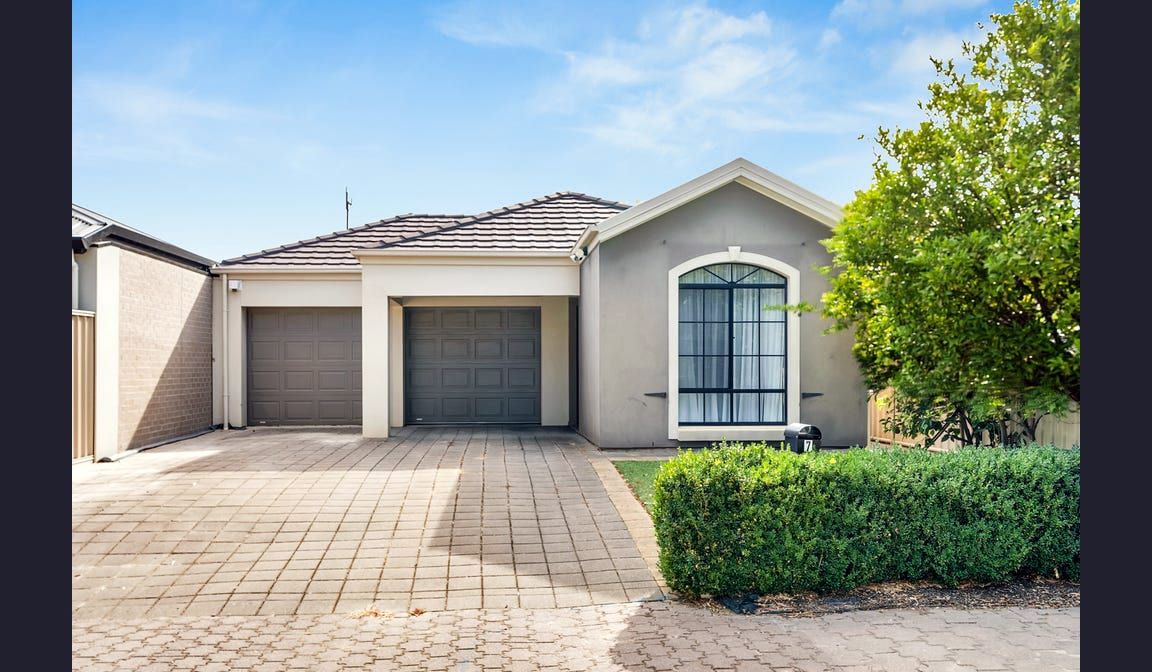 The front of the Condamine Street home in Hillcrest, with a double garage and a paved driveway