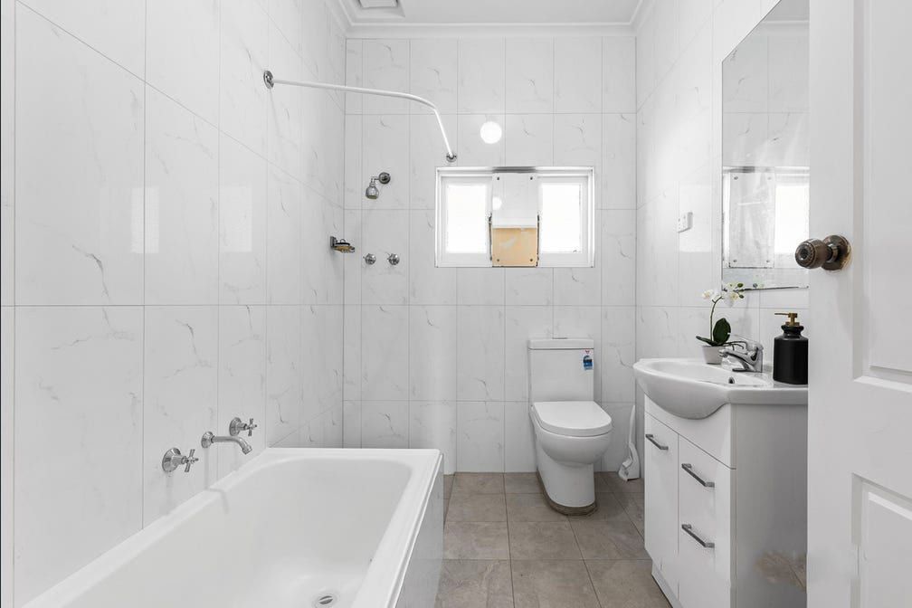 The bathroom at Colton Avenue, with a bath, separate shower and vanity