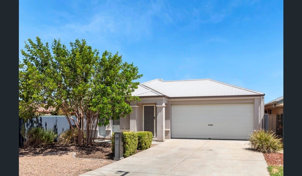 The front of the Peerless Road home in Munno Para West, with a double garage and established garden