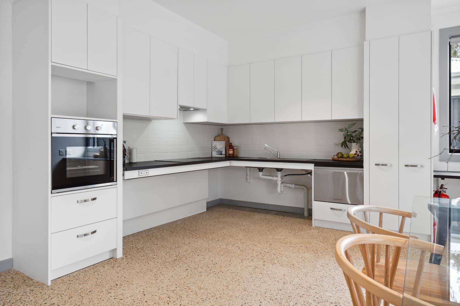 The kitchen bench at Wyndham Road, with an open under-bench space allowing a wheelchair to pull in